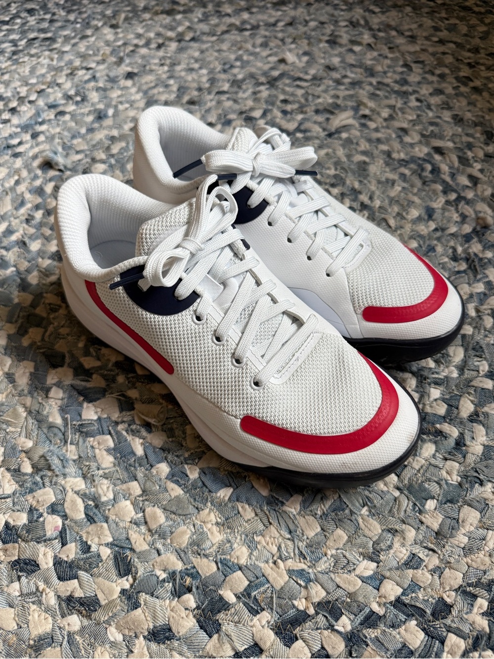 Fila white with navy and red hard court tennis shoes